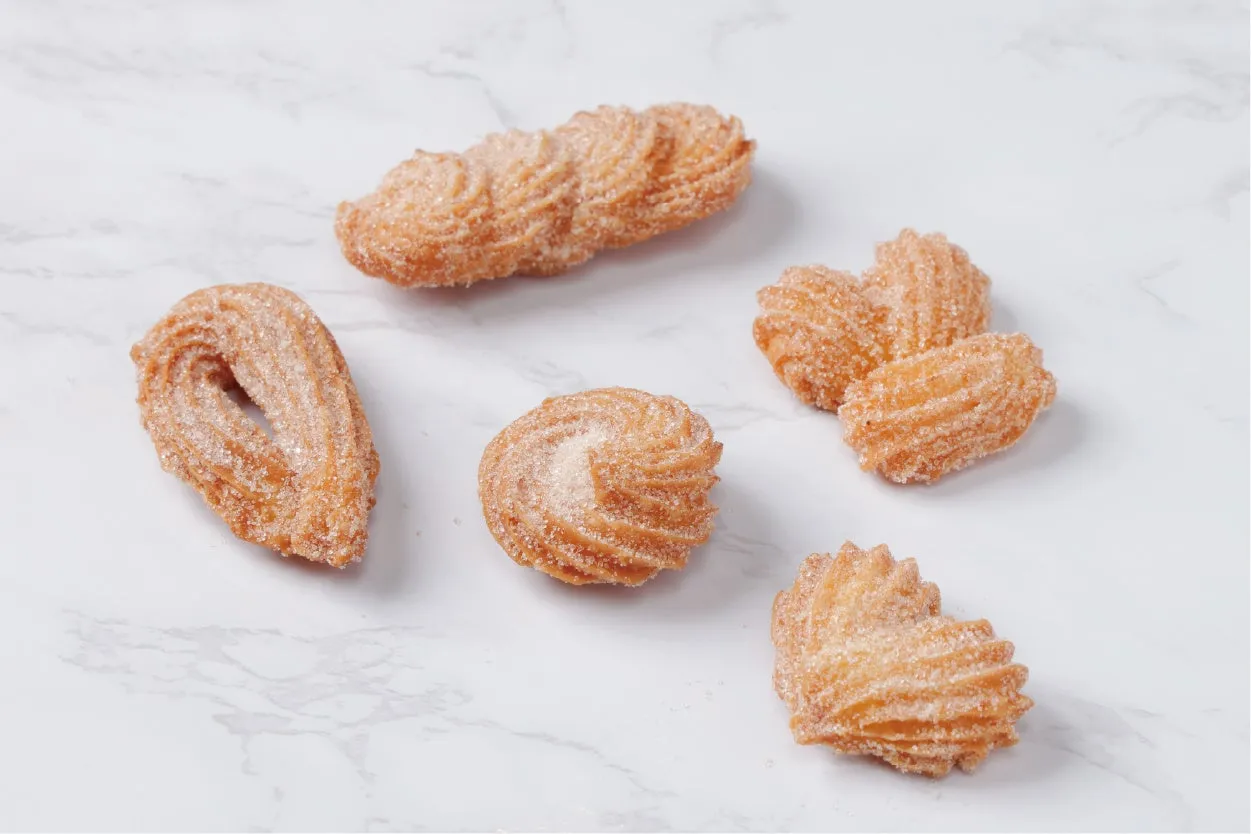 揚げ菓子であるチュロスが複数個写っている画像です。