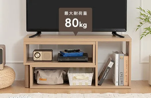 テレビ台の上にテレビが置かれ、その下に収納スペースがある様子。