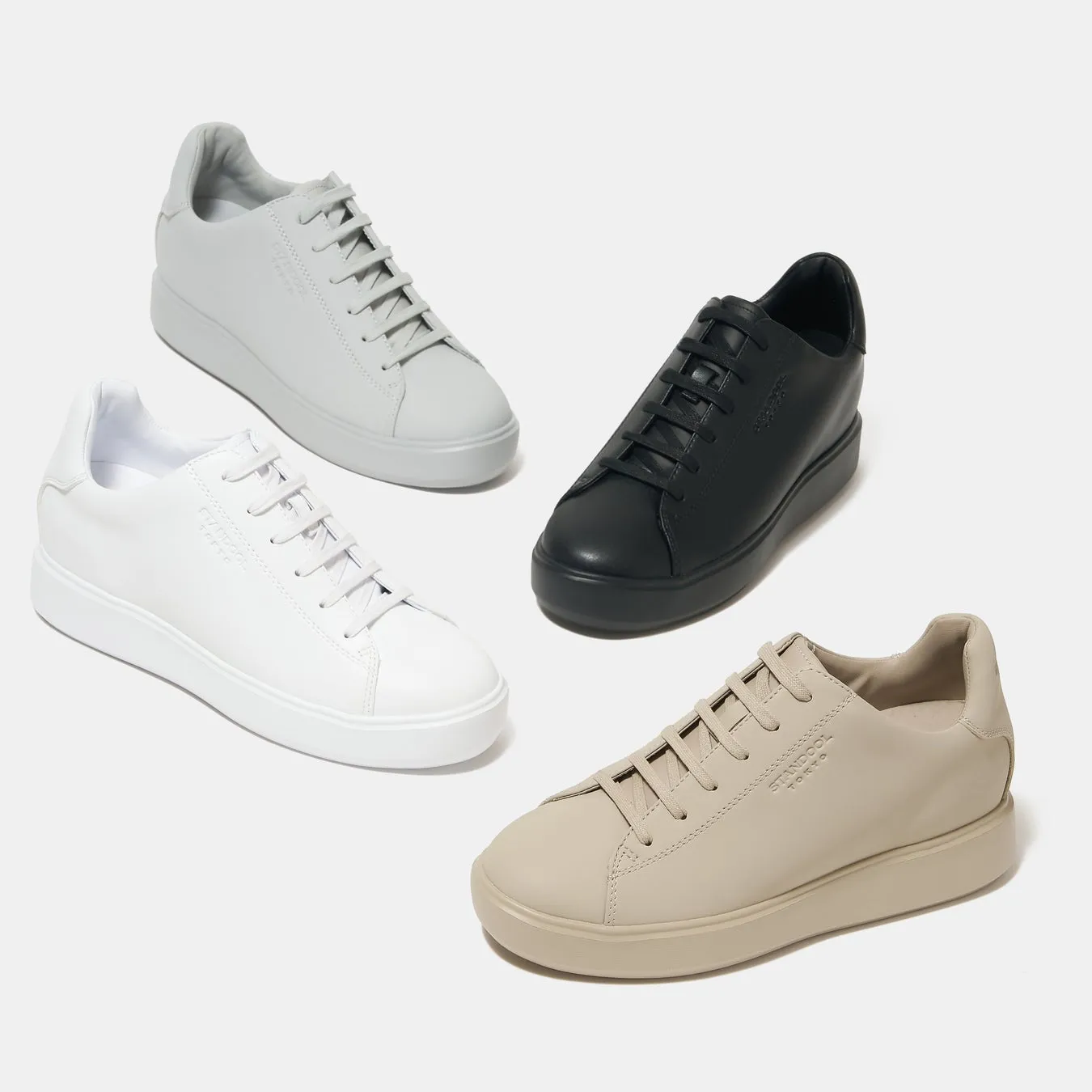 白、黒、グレー、ベージュの4色のスニーカーの写真です。