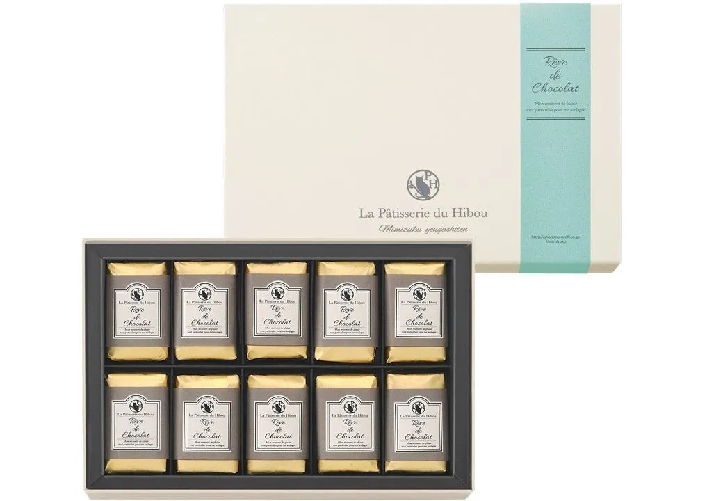 チョコレートのギフトボックス。チョコレートバーが12個入っており、白と金色の包装がされています。箱には「Reve de Chocolat」の文字と、ブランド名が記載されています。