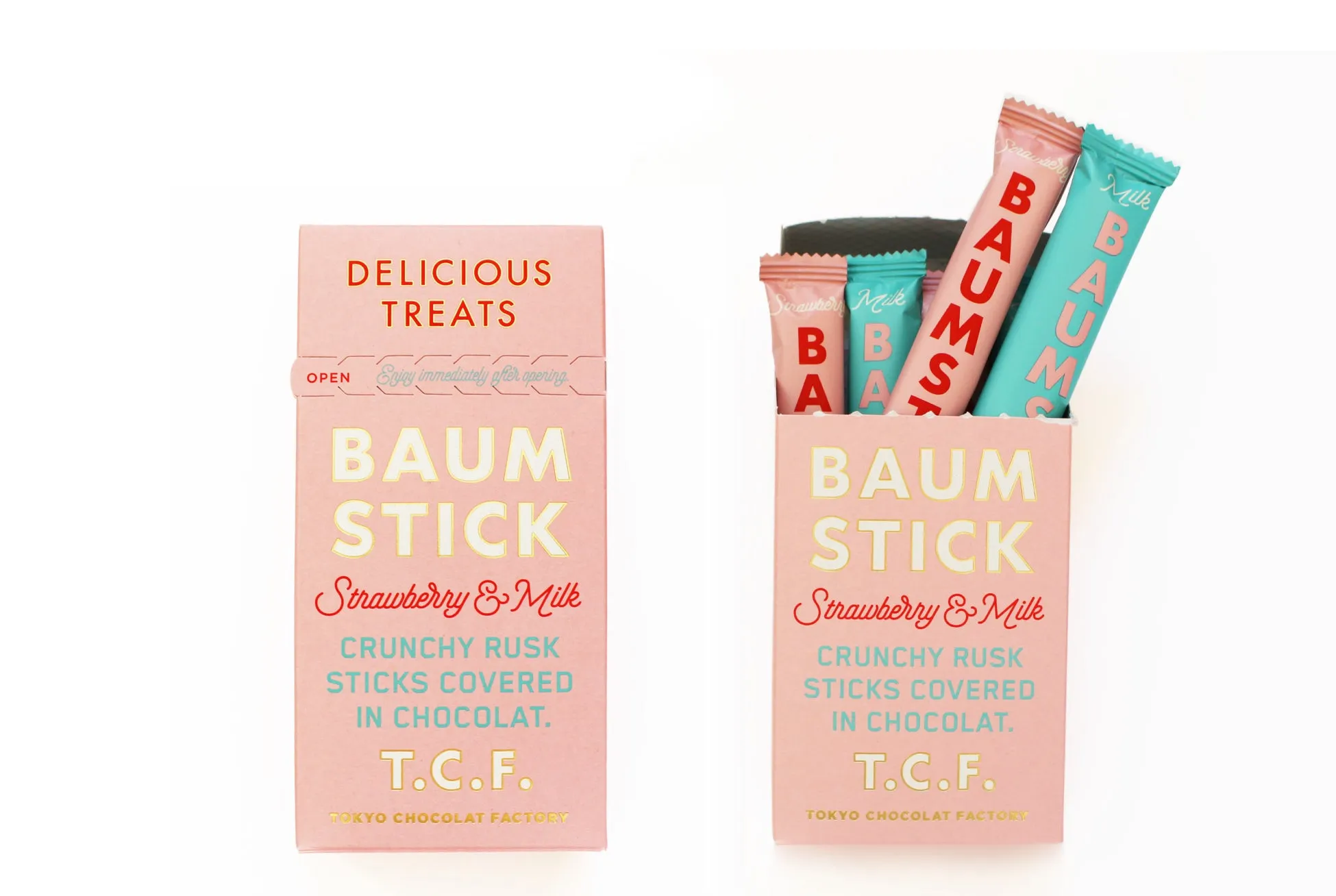 ピンク色の箱に入ったBaum Stickのパッケージ。ストロベリー＆ミルク味で、クランチーラスクスティックがチョコレートでコーティングされている。