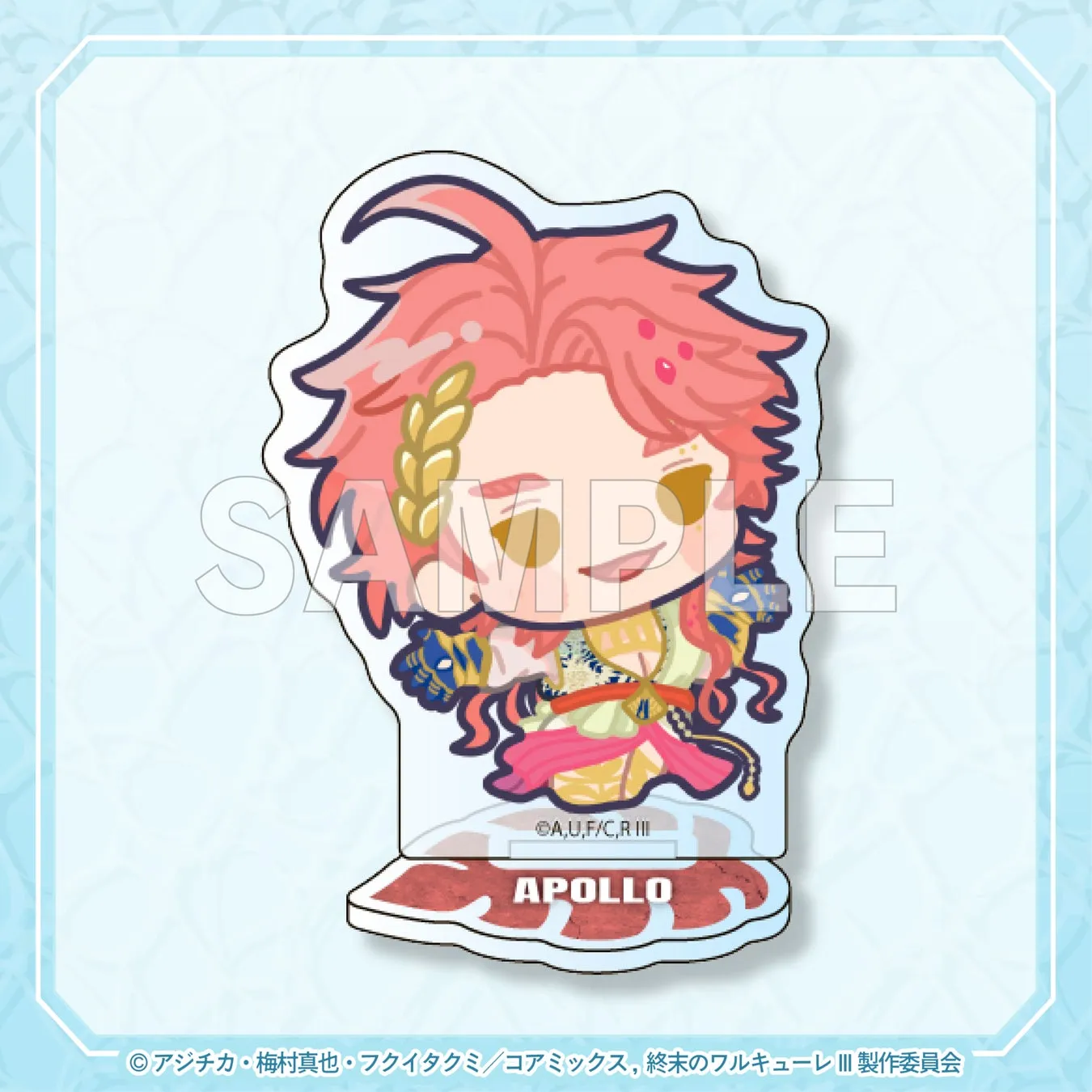 終末のワルキューレのキャラクター、アポロのアクリルスタンドのイラスト。ピンクの髪と金色の装飾が特徴的で、背景には水色の模様が描かれている。