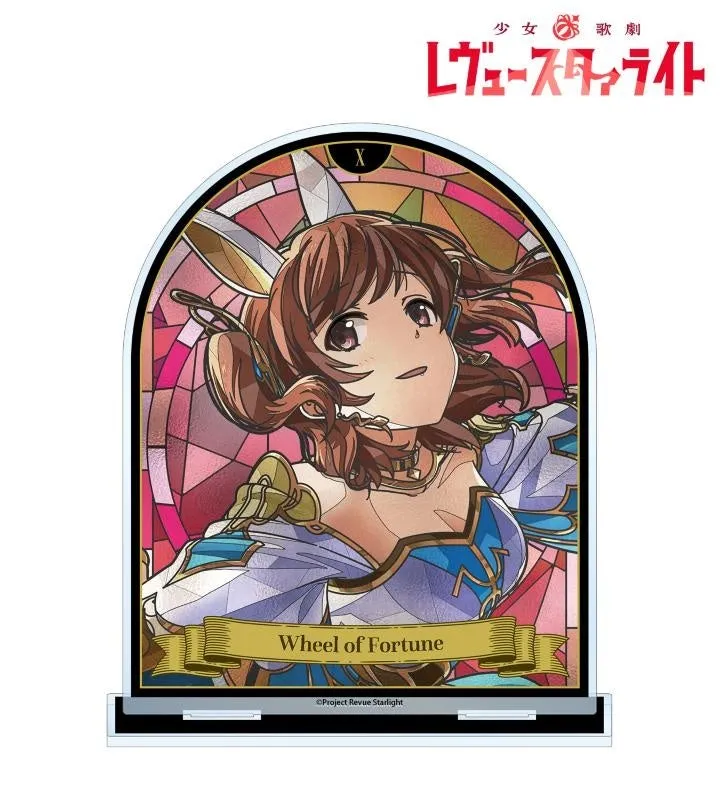 少女歌劇レヴュースタァライトのキャラクターのイラスト。背景はステンドグラス風で、キャラクターは「Wheel of Fortune」と書かれたカードを持っています。