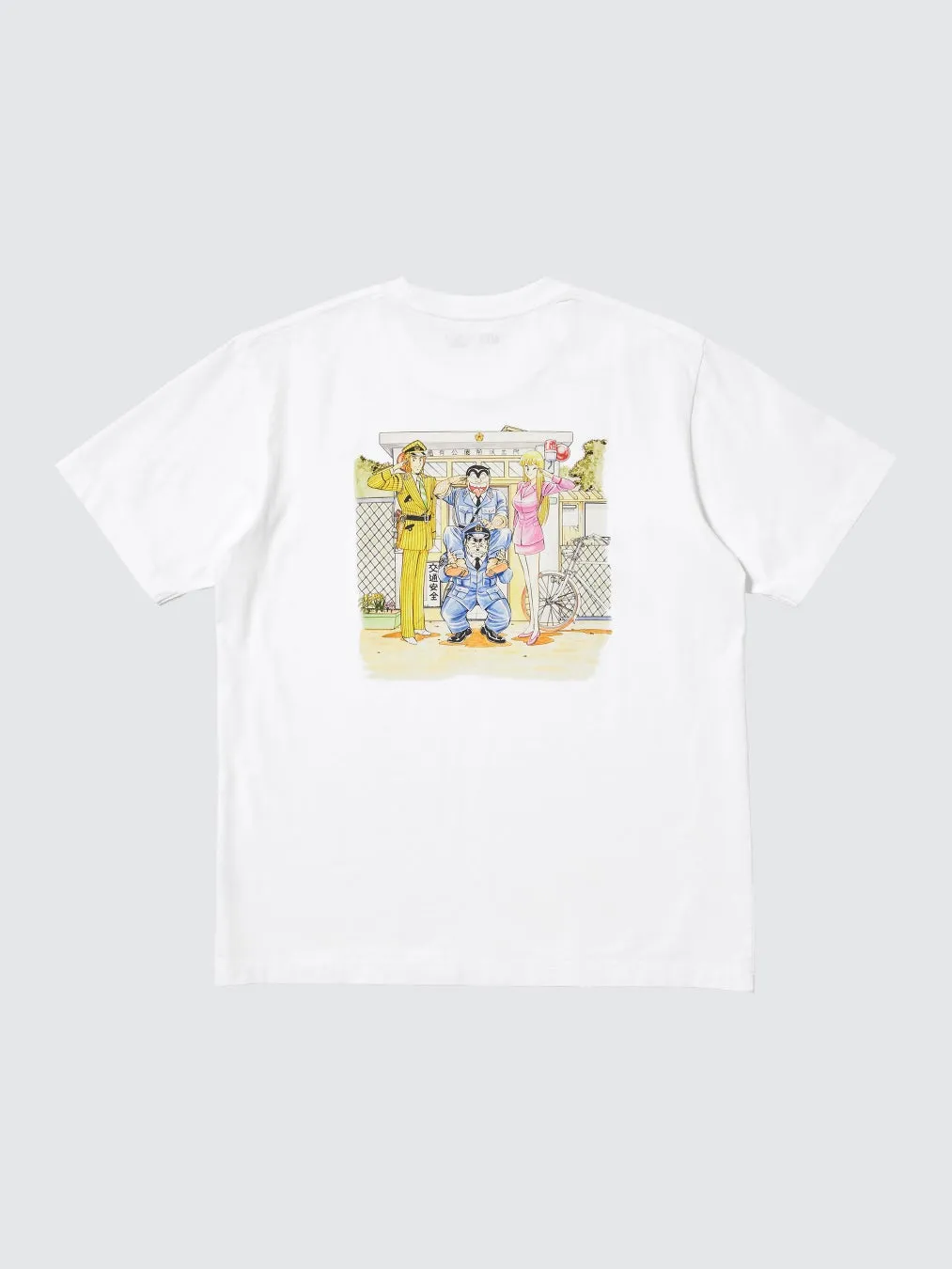 白いTシャツに警察官や女性が描かれたイラスト(交通安全)