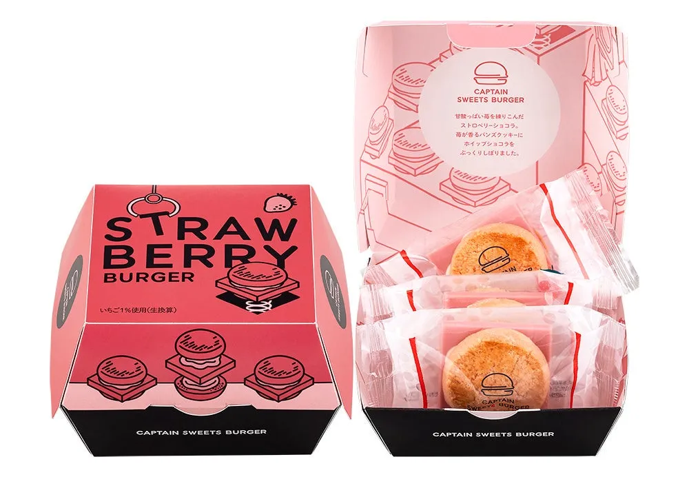 いちご味のスイーツバーガーのパッケージ。箱には「STRAW BERRY BURGER」の文字とイラストが描かれており、中には個包装されたバーガーが入っている。